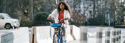 A woman enjoying a stressfree bike ride