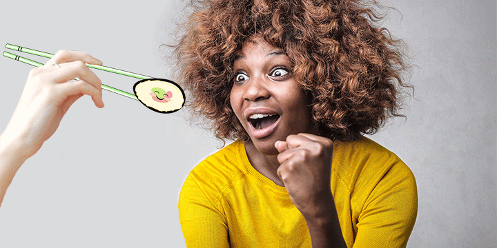 A young woman super-excited to eat sushi