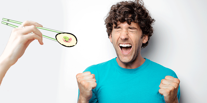 A young man super-excited to eat sushi